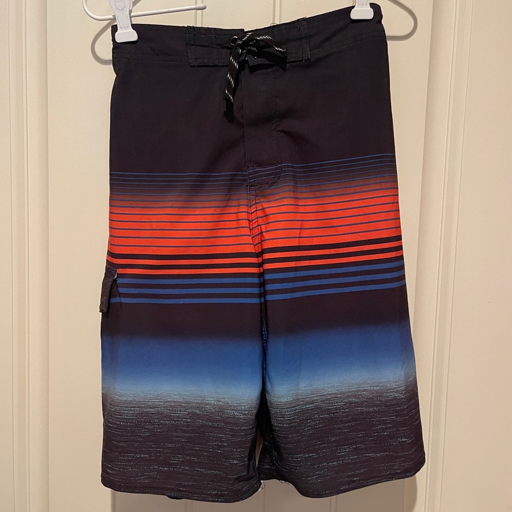 First Wave Brand Boys swim trunks size 14-16. Excellent condition. Hardly worn.